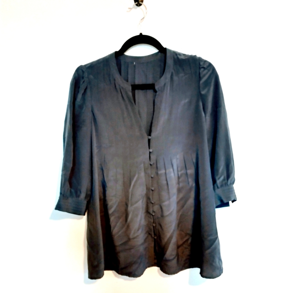Blue top with front buttons. Tags have been removed. I believe it is jcrew size